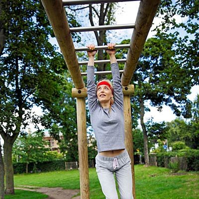 woman-monkey-bars