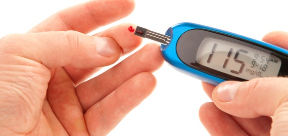 testing blood sugar with a glucometer