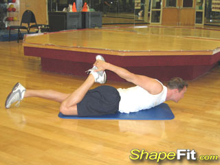 stretching-prone-quadricep-stretch