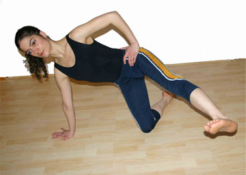 pilates-exercises-kneeling-side-leg-kicks-3