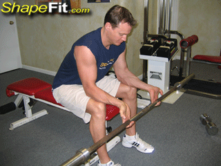 forearms-exercises-seated-palm-up-barbell-wrist-curls
