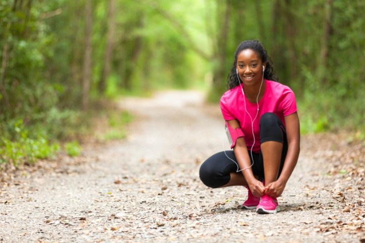 African American woman exercise trail