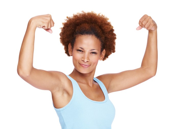 woman flexing arm strong