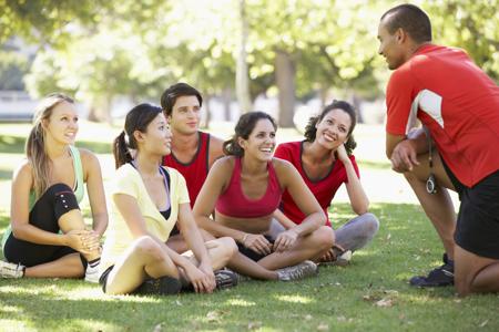 Instructor running fitness boot camp