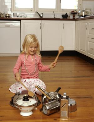 Girl Playing Kitchen Utensils