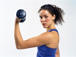 woman lifting dumbbell