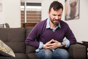 Gastritis symptoms including upper abdominal pain, bloating, and nausea