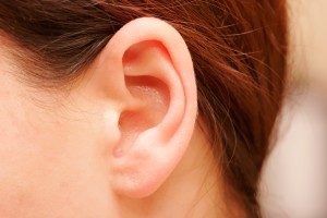 painless lump behind ear