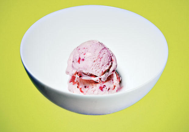 Cut back to two golf ball-size scoops of ice cream—and add some fresh strawberries
