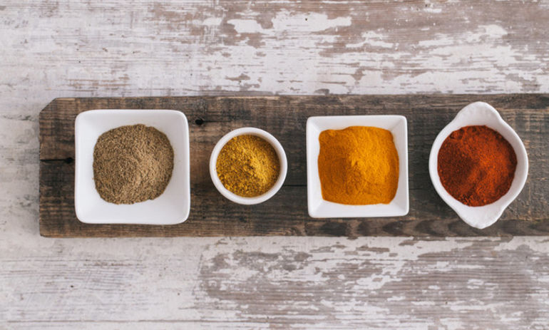 10 Spices & Condiments To Keep In Your Kitchen If You're Trying To Eat Healthy Hero Image