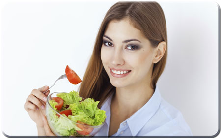Girl eating salad